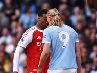 Soccer Football - Premier League - Manchester City v Arsenal - Etihad Stadium, Manchester, Britain - April 19, 2026 Arsenal's Gabriel Magalhaes clashes with Manchester City's Erling Haaland Action Images via Reuters/Lee Smith EDITORIAL USE ONLY. NO USE WITH UNAUTHORIZED AUDIO, VIDEO, DATA, FIXTURE LISTS, CLUB/LEAGUE LOGOS OR 'LIVE' SERVICES. ONLINE IN-MATCH USE LIMITED TO 120 IMAGES, NO VIDEO EMULATION. NO USE IN BETTING, GAMES OR SINGLE CLUB/LEAGUE/PLAYER PUBLICATIONS. PLEASE CONTACT YOUR ACCOUNT REPRESENTATIVE FOR FURTHER DETAILS..
