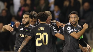 Qarabagh's players celebrate scoring the 1-0 goal during the UEFA Champions League first round day 2 football match between Qarabag FC and FC Copenhagen at the Tofiq Bahramov Republican Stadium in Baku on October 1, 2025. (Photo by Giorgi ARJEVANIDZE / AFP)