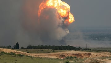 Smoke and flames rise from an explosion during a fire at a military training ground in the Kirovske district, Crimea, July 19, 2023. REUTERS/Stringer     TPX IMAGES OF THE DAY