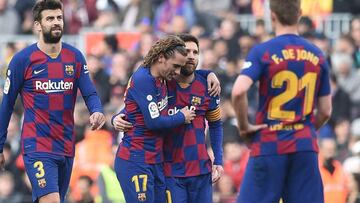 Lionel Messi y Antoine Griezmann celebrando un gol con el Barcelona.