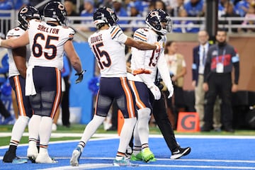 Keenan Allen #13 of the Chicago Bears celebrates with teammates after a fourth quarter touchdown against the Detroit Lions 