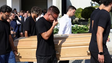 Pallbearers carry a coffin, on the day of the funeral ceremony of Liverpool's Portuguese soccer player Diogo Jota and his brother Andre Silva, who died in a car crash near Zamora, Spain, near the Chapel of the Resurrection in Gondomar, Portugal, July 5, 2025. REUTERS/Rita Franca