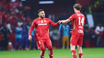 Alexis Vega and Marcel Ruiz of Toluca during the final second leg match between Tigres UANL and Toluca, as part of the Liga BBVA MX, Torneo Apertura 2025 at Nemesio Diez Stadium, on December 14, 2025 in Toluca, Estado de Mexico, Mexico.