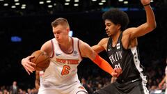 Dec 14, 2017; Brooklyn, NY, USA; New York Knicks power forward Kristaps Porzingis (6) plays the ball against Brooklyn Nets center Jarrett Allen (31) during the first quarter at Barclays Center. Mandatory Credit: Brad Penner-USA TODAY Sports