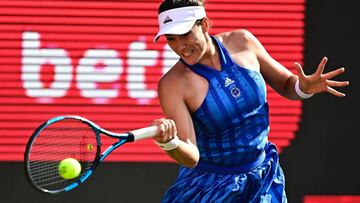 Spain's Garbine Muguruza returns the ball to Romania's Sorana Cirstea during the women's Bett1 Open WTA 500 tennis tournament in Berlin on June 15, 2021. (Photo by Tobias Schwarz / AFP)
