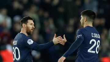 Soccer Football - Ligue 1 - Paris St Germain v Toulouse - Parc des Princes, Paris, France - February 4, 2023 Paris St Germain's Lionel Messi celebrates scoring their second goal with Carlos Soler REUTERS/Gonzalo Fuentes