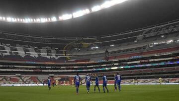 Cruz Azul&#039;s Uruguayan forward Jonathan Rodriguez (C) celebrates with teammates after scoring against America during their Mexican Clausura tournament football match at the Azteca stadium on March 15, 2020, in Mexico City. - The match is played withou