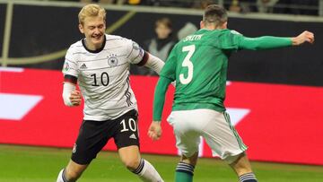 Frankfurt Am Main (Germany), 19/11/2019.- Germanyvïs Julian Brandt (L) in action against Michael Smith of Northern Ireland during the UEFA EURO 2020 Group C qualifying soccer match between Germany and Northern Ireland in Frankfurt am Main, Germany, 1