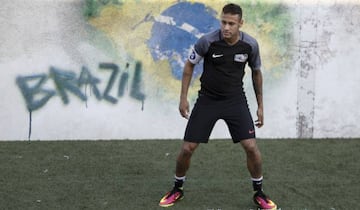 Brazilian Barcelona player Neymar takes part in a five-a-side football match, as part of a Neymar Junior Institute project, in Praia Grande, Sao Paulo, Brazil