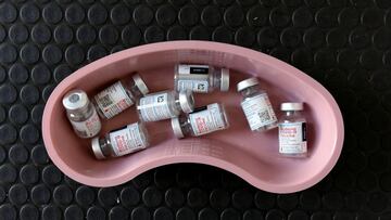 Empty vials of Moderna COVID-19 vaccine are pictured in a kidney dish at a rest stop near Drayton, North Dakota where Manitoba-based truckers, transporting goods to and from the United States, were vaccinated against coronavirus disease (COVID-19) as part