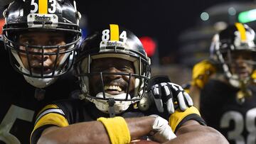 PITTSBURGH, PA - DECEMBER 02: Antonio Brown #84 of the Pittsburgh Steelers reacts with Maurkice Pouncey #53 after a 28 yard touchdown reception in the second quarter during the game against the Los Angeles Chargers at Heinz Field on December 2, 2018 in Pi