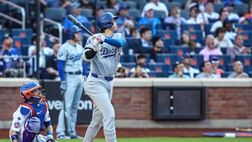 May 29, 2024; New York City, New York, USA;  Los Angeles Dodgers designated hitter Shohei Ohtani (17) hits a two rum home run in the eighth inning against the New York Mets at Citi Field. Mandatory Credit: Wendell Cruz-USA TODAY Sports