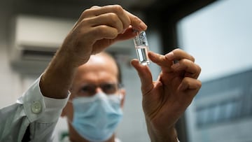 A laboratory assistant holds a tube with Russia's "Sputnik-V" vaccine against the coronavirus disease (COVID-19) at the National Institute of Pharmacy and Nutrition in Budapest, Hungary, November 19, 2020. Matyas Borsos/Hungarian Foreign Ministry/Handout via REUTERS THIS IMAGE HAS BEEN SUPPLIED BY A THIRD PARTY. NO RESALES. NO ARCHIVES