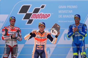 Marc Márquez, Andrea Dovizioso y Iannone en podio de MOtorland. 