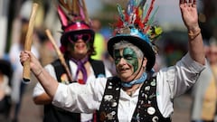 Performers dance at the Rochester Sweeps Festival, a three-day May Day celebration in Rochester, Britain, April 30, 2023.   REUTERS/Kevin Coombs