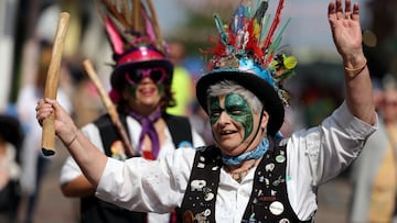 Performers dance at the Rochester Sweeps Festival, a three-day May Day celebration in Rochester, Britain, April 30, 2023.   REUTERS/Kevin Coombs