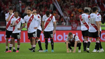 Players of River Plate react after losing 9-8 in the penalty shoot-out of the Copa Libertadores round of 16 second leg football match between Brazil's Internacional and Argentina's River Plate at the Beira-Rio stadium in Porto Alegre, Brazil, on August 8, 2023. (Photo by NELSON ALMEIDA / AFP)
