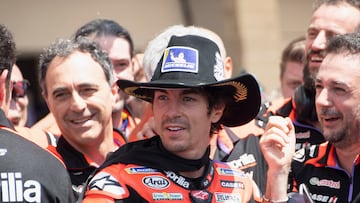 AUSTIN, TEXAS - APRIL 14: Maverick Vinales of Spain and Aprilia Racing celebrates the victory under the podium during the MotoGP Race during the MotoGP Of The Americas - Race on April 14, 2024 in Austin, Texas.   Mirco Lazzari gp/Getty Images/AFP (Photo by Mirco Lazzari gp / GETTY IMAGES NORTH AMERICA / Getty Images via AFP)