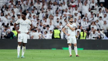 Soccer Football - LaLiga - Real Madrid v Almeria - Santiago Bernabeu, Madrid, Spain - January 21, 2024 Real Madrid's Aurelien Tchouameni and Nacho react after Almeria's Edgar Gonzalez scores their second goal REUTERS/Isabel Infantes