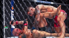 Jun 24, 2023; Jacksonville, Florida, USA; Josh Emmett (red gloves) fights Ilia Topuria (blue gloves) in a featherweight bout during UFC Fight Night at VyStar Veterans Memorial Arena. Mandatory Credit: David Yeazell-USA TODAY Sports