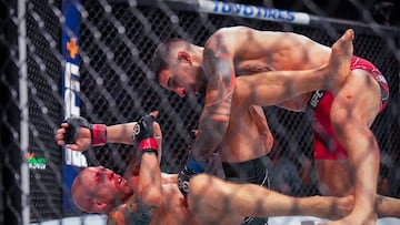 Jun 24, 2023; Jacksonville, Florida, USA; Josh Emmett (red gloves) fights Ilia Topuria (blue gloves) in a featherweight bout during UFC Fight Night at VyStar Veterans Memorial Arena. Mandatory Credit: David Yeazell-USA TODAY Sports