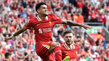Liverpool's Colombian midfielder #07 Luis Diaz celebrates after scoring their second goal during the English Premier League football match between Liverpool and Arsenal at Anfield in Liverpool, north west England on May 11, 2025. (Photo by PETER POWELL / AFP) / RESTRICTED TO EDITORIAL USE. No use with unauthorized audio, video, data, fixture lists, club/league logos or 'live' services. Online in-match use limited to 120 images. An additional 40 images may be used in extra time. No video emulation. Social media in-match use limited to 120 images. An additional 40 images may be used in extra time. No use in betting publications, games or single club/league/player publications. /