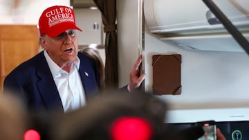 U.S. President Donald Trump speaks to reporters aboard Air Force One en route to Joint Base Andrews, Maryland, after touring a temporary migrant detention center informally known as "Alligator Alcatraz" in Ochopee, Florida, U.S., July 1, 2025. REUTERS/Evelyn Hockstein