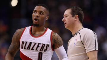PHOENIX, AZ - NOVEMBER 02: Damian Lillard #0 of the Portland Trail Blazers talks with referee Scott Twardoski #52 during the first half of the NBA game against the Phoenix Suns at Talking Stick Resort Arena on November 2, 2016 in Phoenix, Arizona. NOTE TO USER: User expressly acknowledges and agrees that, by downloading and or using this photograph, User is consenting to the terms and conditions of the Getty Images License Agreement.   Christian Petersen/Getty Images/AFP
 == FOR NEWSPAPERS, INTERNET, TELCOS &amp; TELEVISION USE ONLY ==