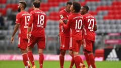 Bayern Munich&#039;s German midfielder Leroy Sane (2nd R) celebrates scoring the 4-0 goal with his team-mate Bayern Munich&#039;s German defender Jerome Boateng (C) and Bayern Munich&#039;s Austrian defender David Alaba (R) during the German first division Bundesliga football match between FC Bayern Munich and Eintracht Frankfurt on October 24, 2020 in Munich, southern Germany. (Photo by CHRISTOF STACHE / various sources / AFP) / DFL REGULATIONS PROHIBIT ANY USE OF PHOTOGRAPHS AS IMAGE SEQUENCES AND/OR QUASI-VIDEO