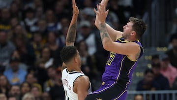 Luka Doncic #77 of the Los Angeles Lakers puts up a shot against Michael Porter Jr. #1 of the Denver Nuggets in the third quarter at Ball Arena on February 22, 2025 in Denver, Colorado.