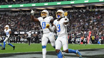 LAS VEGAS, NEVADA - JANUARY 05: Daiyan Henley #0 and Derwin James Jr. #3 of the Los Angeles Chargers gesture to the crowd after a play against the Las Vegas Raiders during the fourth quarter at Allegiant Stadium on January 05, 2025 in Las Vegas, Nevada. Candice Ward/Getty Images/AFP (Photo by Candice Ward / GETTY IMAGES NORTH AMERICA / Getty Images via AFP)