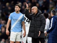 Soccer Football - FA Cup - Fourth Round - Manchester City v Salford City - Etihad Stadium, Manchester, Britain - February 14, 2026 Manchester City manager Pep Guardiola gives instructions to Nico Gonzalez REUTERS/Peter Powell