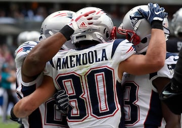 New England Patriots' Danny Amendola celebrates his touchdown against Oakland Raiders during the 2016 NFL week 11 regular season football game on November 19, 2017 at the Azteca Stadium in Mexico City. / AFP PHOTO / ALFREDO ESTRELLA