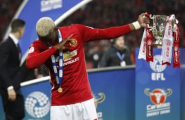 Britain Soccer Football - Southampton v Manchester United - EFL Cup Final - Wembley Stadium - 26/2/17 Manchester United's Paul Pogba celebrates with the trophy 