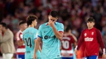 Barcelona's Spanish forward #07 Ferran Torres reacts at the end of the Spanish league football match between Granada FC and FC Barcelona at the Nuevo Estadio de Los Carmenes in Granada on October 8, 2023. (Photo by JORGE GUERRERO / AFP)