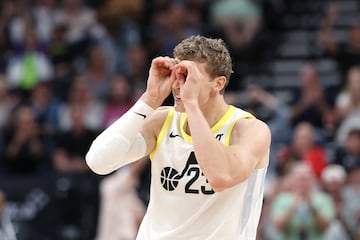 Utah Jazz forward Lauri Markkanen (23) reacts to a dunk