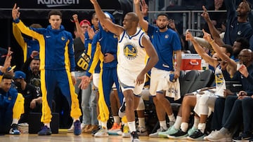 Golden State Warriors guard Chris Paul (3) celebrates after making a three-point basket