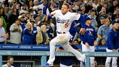 Apr 18, 2022; Los Angeles, California, USA; Los Angeles Dodgers first baseman Freddie Freeman (5) scores in the fourth inning against the Atlanta Braves at Dodger Stadium. Mandatory Credit: Richard Mackson-USA TODAY Sports