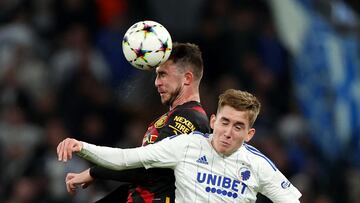 Soccer Football - Champions League - Group G - FC Copenhagen v Manchester City - Parken, Copenhagen, Denmark - October 11, 2022 Manchester City's Aymeric Laporte in action with FC Copenhagen's Isak Bergmann Johannesson Action Images via Reuters/Andrew Boyers