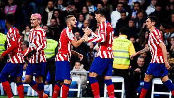 Los jugadores del Atlético celebran el gol de Morata ante el Real Madrid.