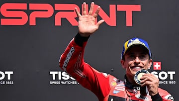 Ducati Lenovoi Team's Spanish MotoGP rider Marc Marquez celebrates after winning the sprint, on the eve of the Italian Moto GP Grand Prix at Mugello circuit, in Mugello, near Florence, on June 21, 2025. (Photo by Tiziana FABI / AFP)