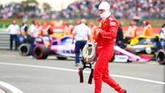 NORTHAMPTON, ENGLAND - JULY 14: 16th placed Sebastian Vettel of Germany and Ferrari looks dejected in parc ferme during the F1 Grand Prix of Great Britain at Silverstone on July 14, 2019 in Northampton, England. (Photo by Dan Istitene/Getty Images)