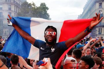 French fans take to the streets to celebrate World Cup final place