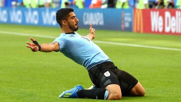 Luis Suarez celebrates his goal against Russia