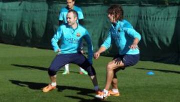 Iniesta con Puyol