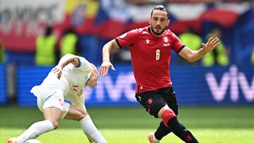 Georgia's midfielder #06 Giorgi Kochorashvili (R) fights for the ball with Czech Republic's forward #17 Vaclav Cerny (L) during the UEFA Euro 2024 Group F football match between Georgia and the Czech Republic at the Volksparkstadion in Hamburg on June 22, 2024. (Photo by GABRIEL BOUYS / AFP)
