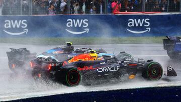 MONTREAL, QUEBEC - JUNE 09: Sergio Perez of Mexico driving the (11) Oracle Red Bull Racing RB20 battles for position with Esteban Ocon of France driving the (31) Alpine F1 A524 Renault on track during the F1 Grand Prix of Canada at Circuit Gilles Villeneuve on June 09, 2024 in Montreal, Quebec.   Mark Thompson/Getty Images/AFP (Photo by Mark Thompson / GETTY IMAGES NORTH AMERICA / Getty Images via AFP)
