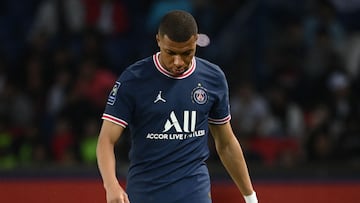 Paris Saint Germain's French forward Kylian Mbappe reacts at the end of the French L1 football match between Paris Saint Germain (PSG) and ES Troyes AC at The Parc des Princes Stadium in Paris on May 8, 2022.   The match ended 2 2. (Photo by FRANCK FIFE / AFP)