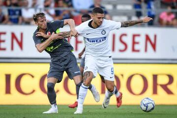 FC Sion's Swiss midfielder Anto Grgic vies with Inter Milan's Argentinian forward Mauro Icardi during a friendly football match between FC Sion and Inter Milan on July 18, 2018 at Tourbillon stadium in Sion.