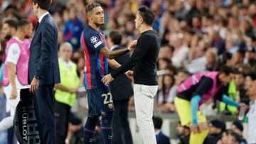 BARCELONA, SPAIN - OCTOBER 12: Raphinha of FC BarcelonaCoach Xavi of FC Barcelona during the UEFA Champions League match between FC Barcelona v Internazionale at the Spotify Camp Nou on October 12, 2022 in Barcelona Spain (Photo by David S. Bustamante/Soccrates/Getty Images)